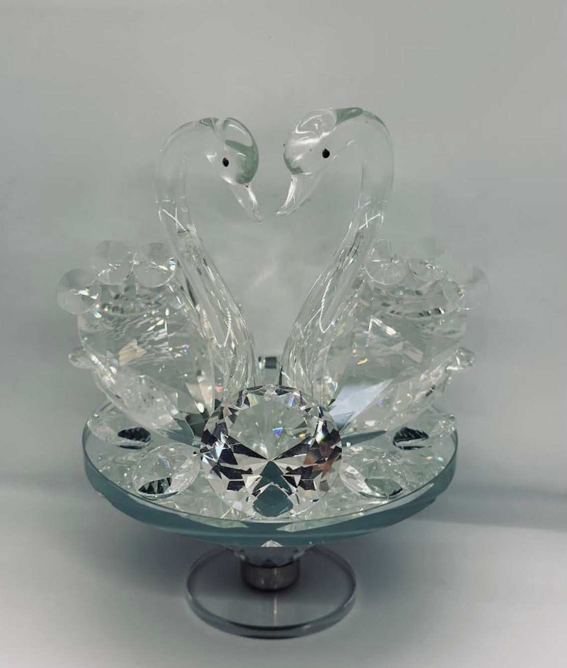 Serenity in Crystal: The Graceful Swan Duo