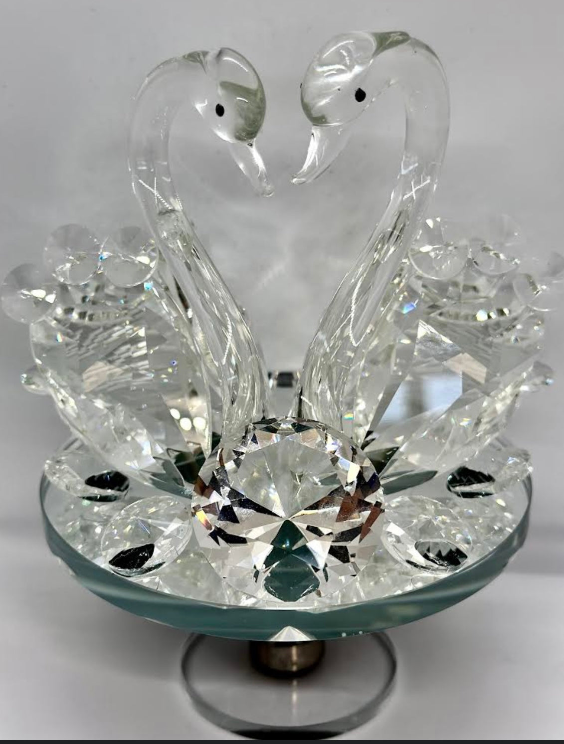Serenity in Crystal: The Graceful Swan Duo